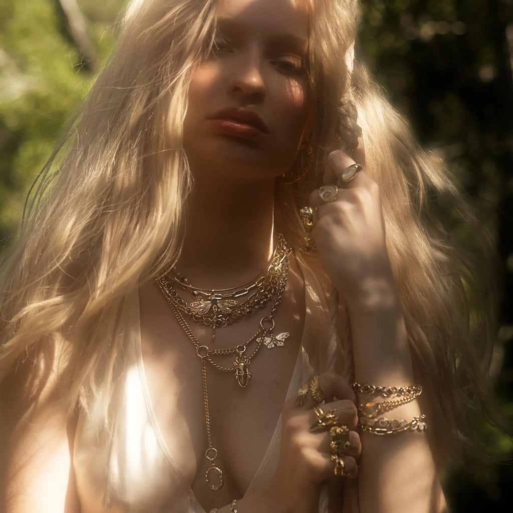 Asymmetrical Charm Collector Necklace